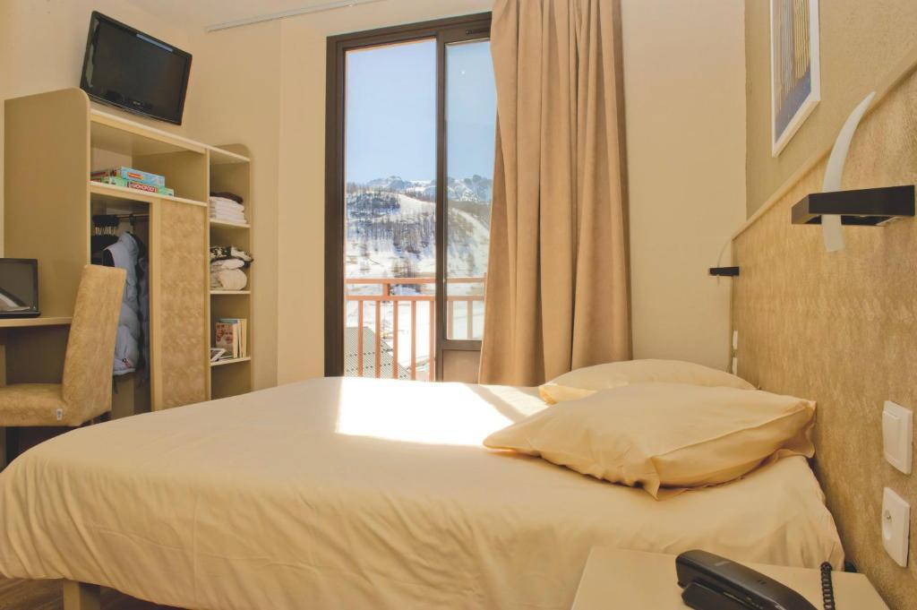 Vtf Le Grand Hotel Montgenèvre Rom bilde